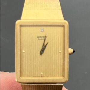 Seiko Gold Watch with Black Accents